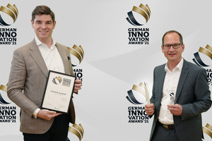  Mike Bucher (Chairman of the Executive Board) and Werner Venter (Product Manager of Isolink) are pleased about the special award 